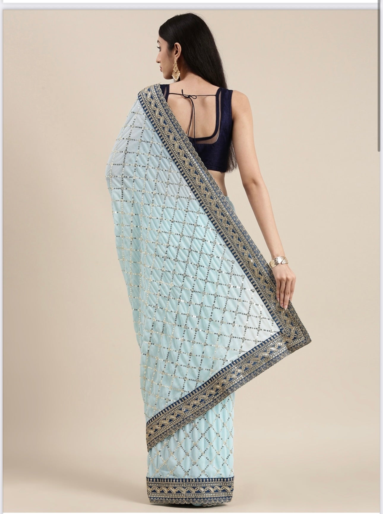 Elegant Georgette traditional saree for women in vibrant colors, showcasing intricate cultural design by Saree Ghor Charlotte.