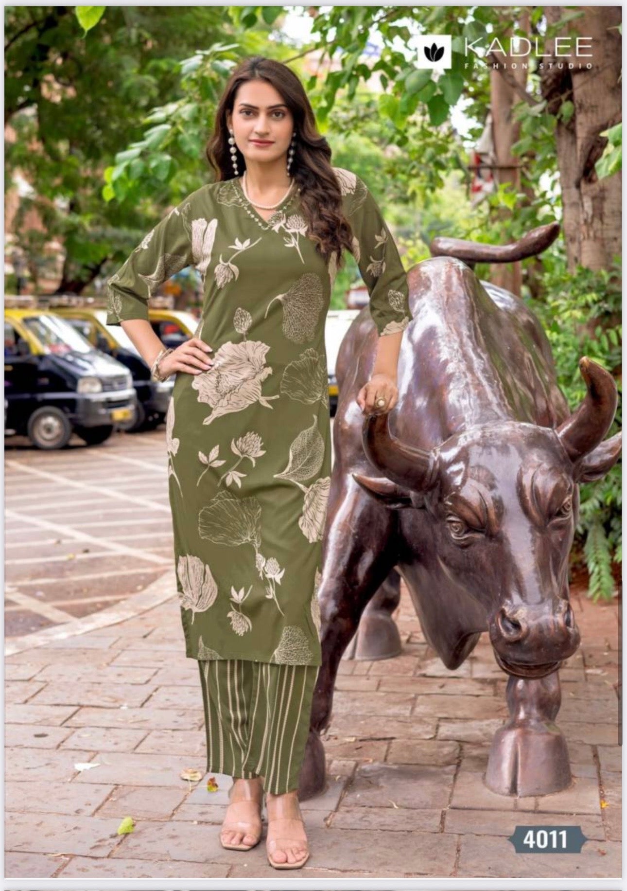 Rayon print traditional two-piece kurti set for women, cultural wear salwar kameez by Saree Ghor Charlotte, showing vibrant design and fabric.
