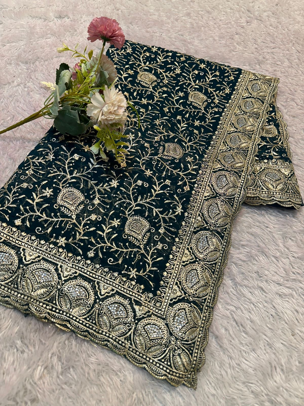 Traditional Saree by Saree Ghor Charlotte featuring vibrant cultural patterns and elegant draping for women.