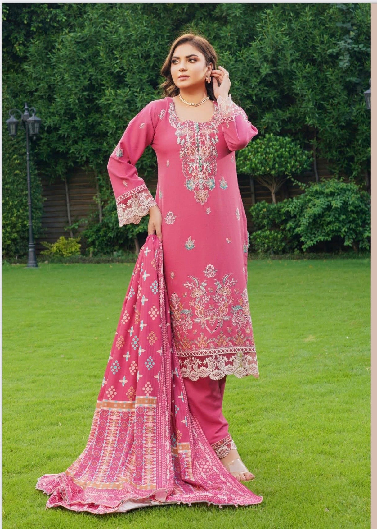 Traditional Pakistani Salwar Kameez for women, colorful attire with intricate embroidery, by Saree Ghor Charlotte.