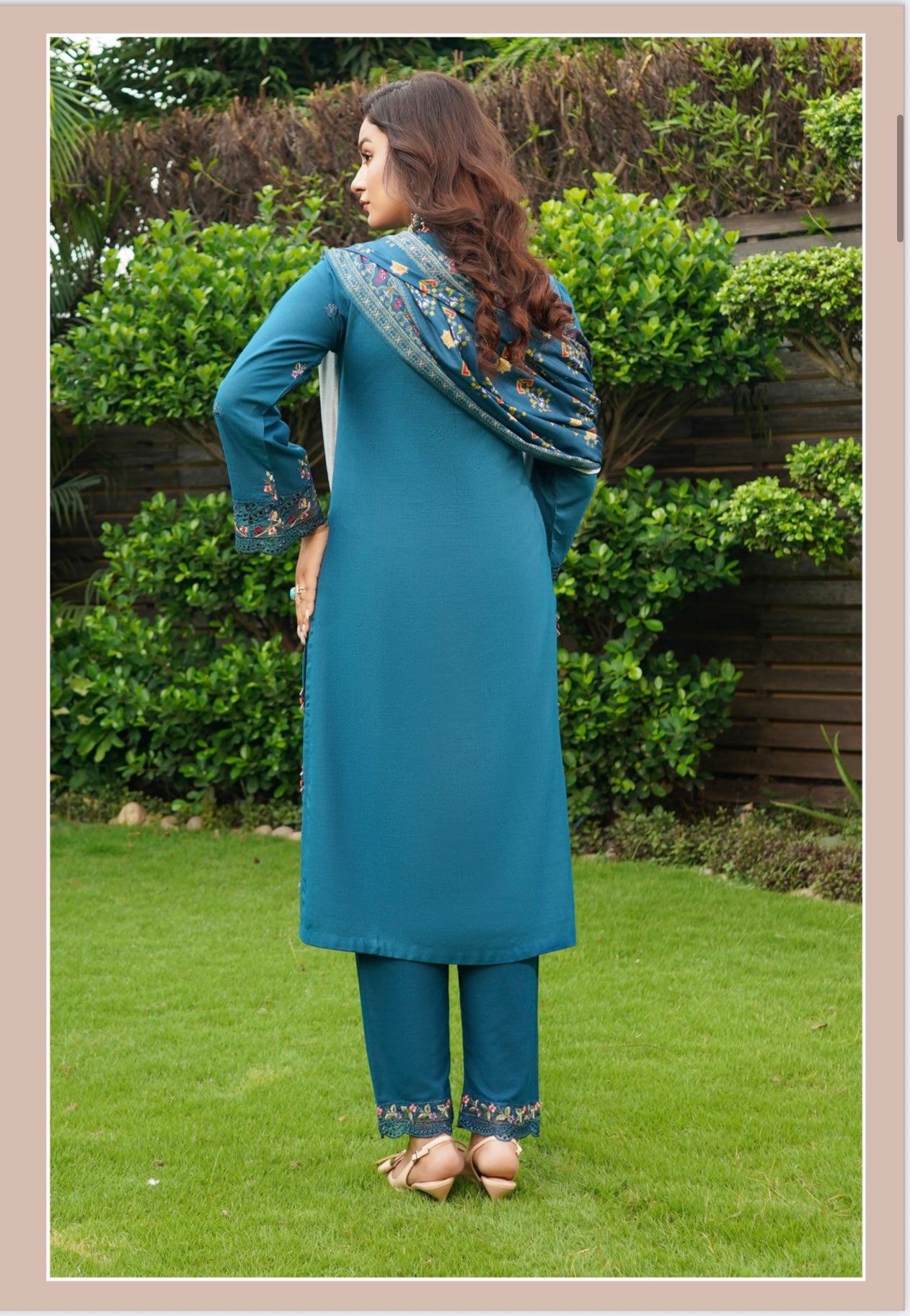 Traditional Pakistani Salwar Kameez for women, featuring vibrant fabric and intricate embroidery, by Saree Ghor Charlotte.
