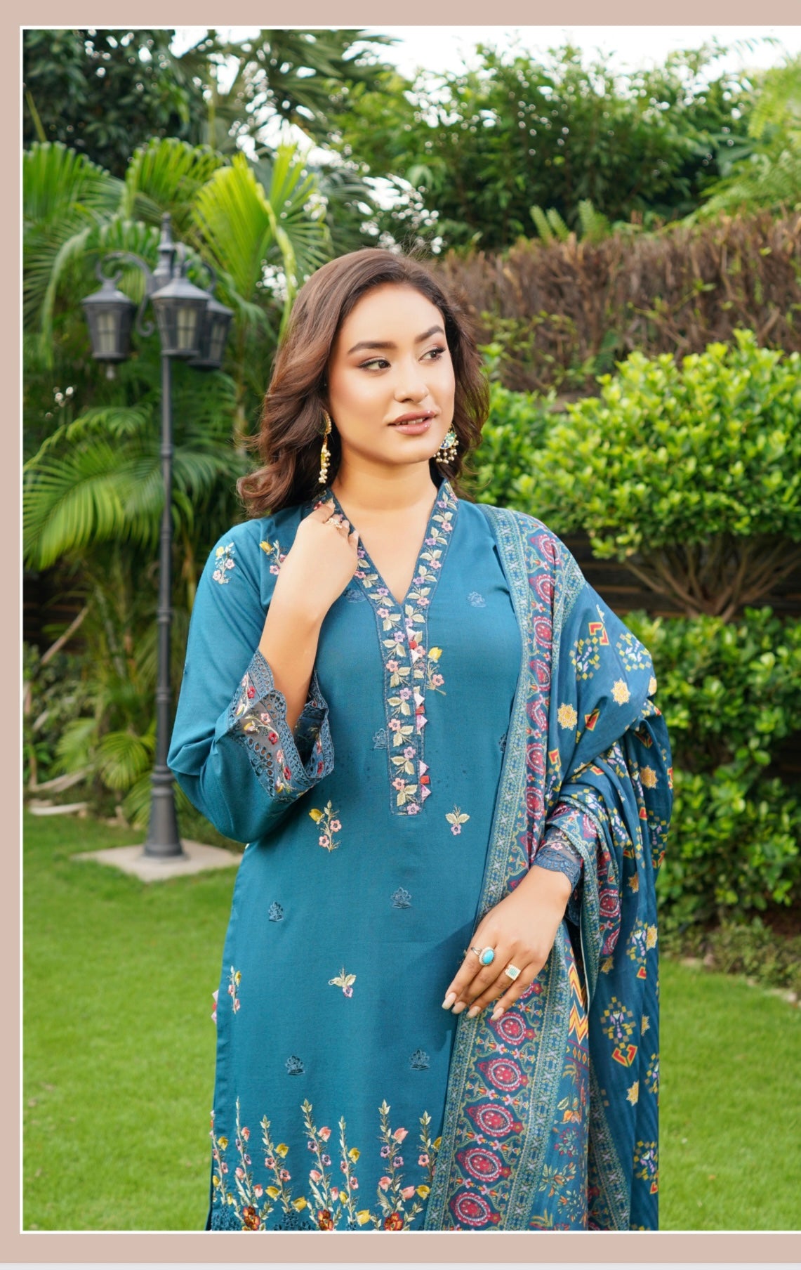 Traditional Pakistani Salwar Kameez for women featuring colorful embroidery and intricate designs, by Saree Ghor Charlotte.