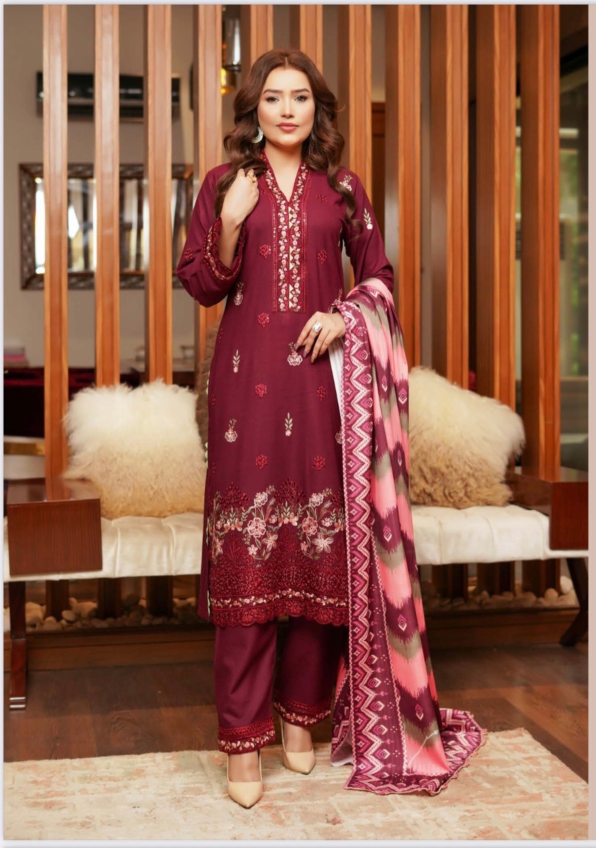 Traditional Pakistani Salwar Kameez for women featuring vibrant fabric and intricate embroidery, by Saree Ghor Charlotte.