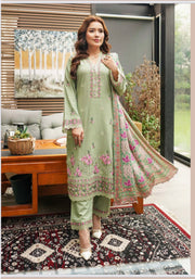 Traditional Pakistani Salwar Kameez for women by Saree Ghor Charlotte, featuring colorful embroidery and elegant cultural design.