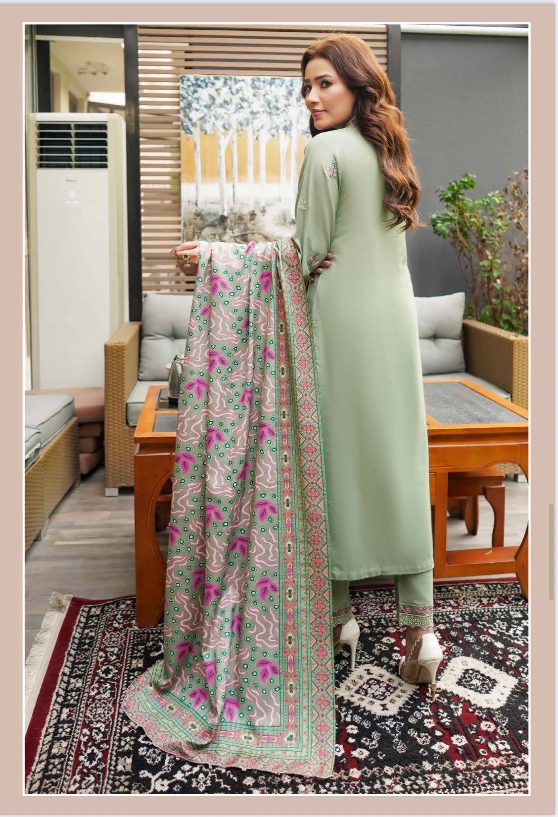 Traditional Pakistani Salwar Kameez for women by Saree Ghor Charlotte, featuring intricate embroidery and vibrant fabric.