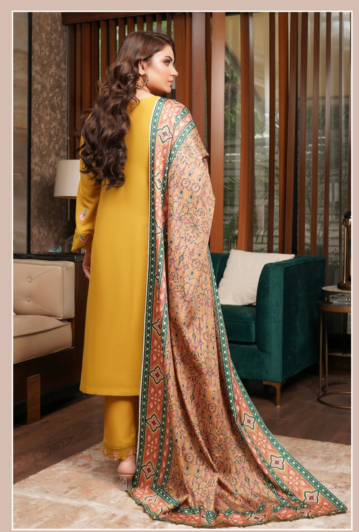 Traditional Pakistani Salwar Kameez for women, featuring colorful fabric and intricate embroidery from Saree Ghor Charlotte.