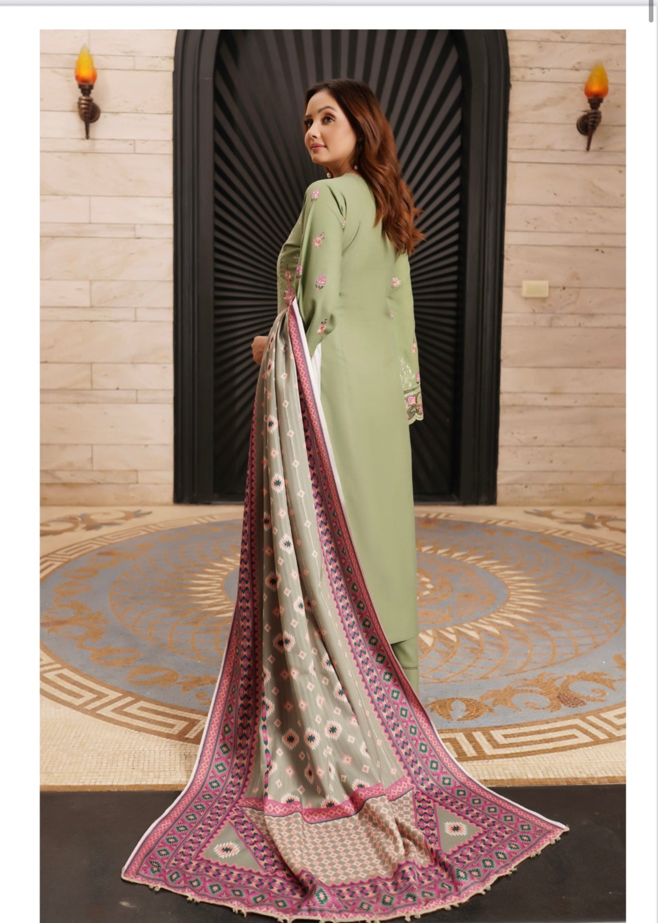Traditional Pakistani Salwar Kameez for women, featuring intricate embroidery and vibrant colors, by Saree Ghor Charlotte.