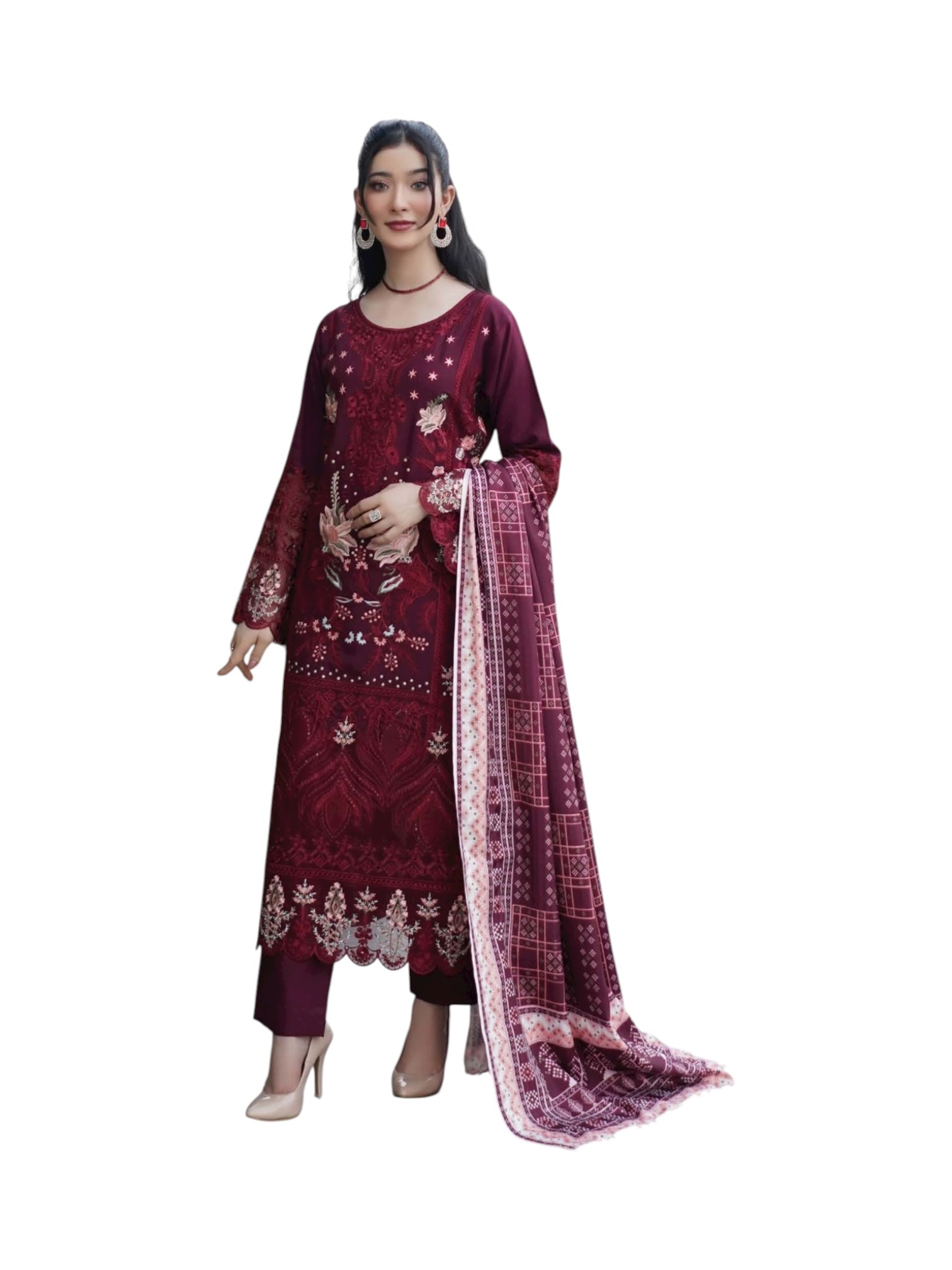 Traditional Pakistani Salwar Kameez by Saree Ghor Charlotte, vibrant cultural wear for women with intricate embroidery and colorful fabric.