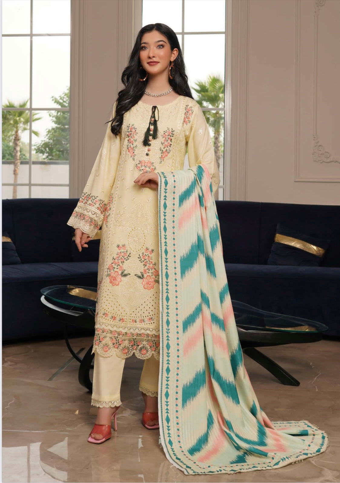 Traditional Pakistani Salwar Kameez for women, featuring vibrant fabric and intricate embroidery, by Saree Ghor Charlotte.