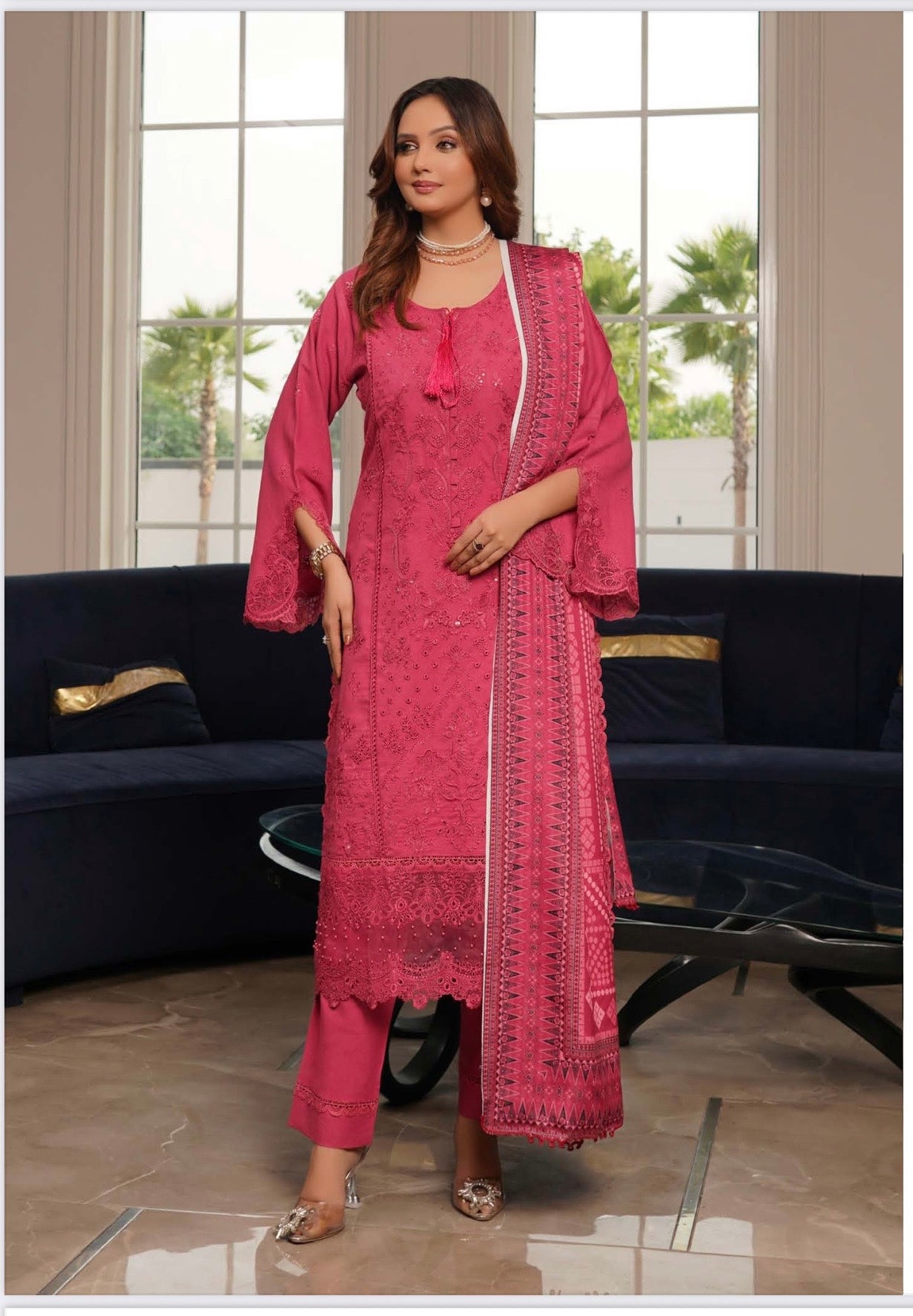Traditional Pakistani Salwar Kameez for women, featuring vibrant fabric and intricate embroidery, by Saree Ghor Charlotte.