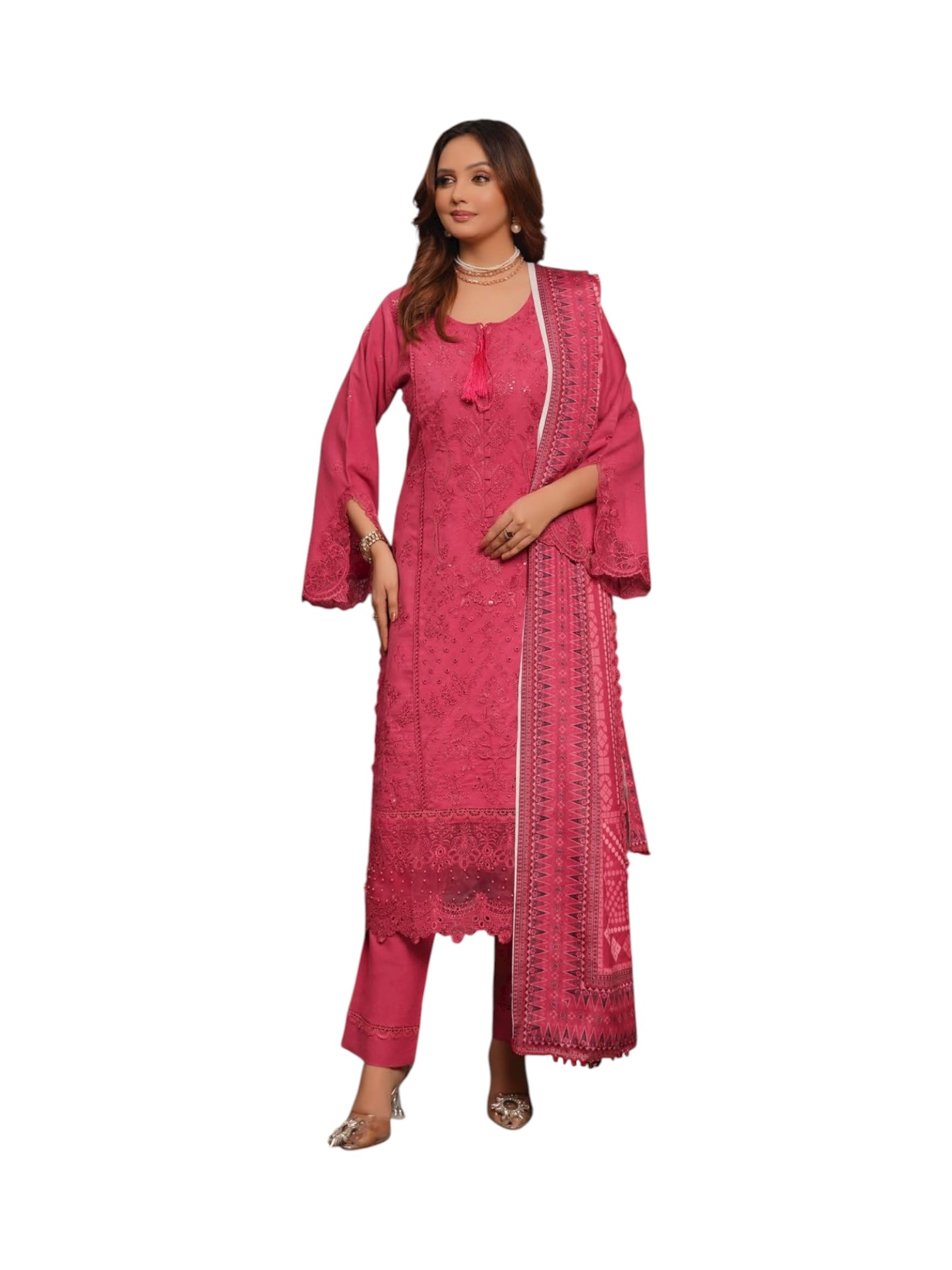 Traditional Pakistani Salwar Kameez for women, featuring intricate embroidery and vibrant colors, by Saree Ghor Charlotte.