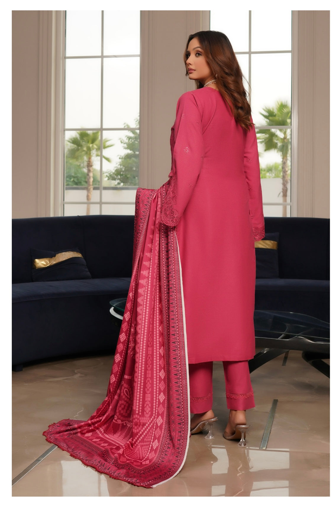 Traditional Pakistani Salwar Kameez by Saree Ghor Charlotte, showcasing vibrant fabric and intricate embroidery for women's cultural wear.