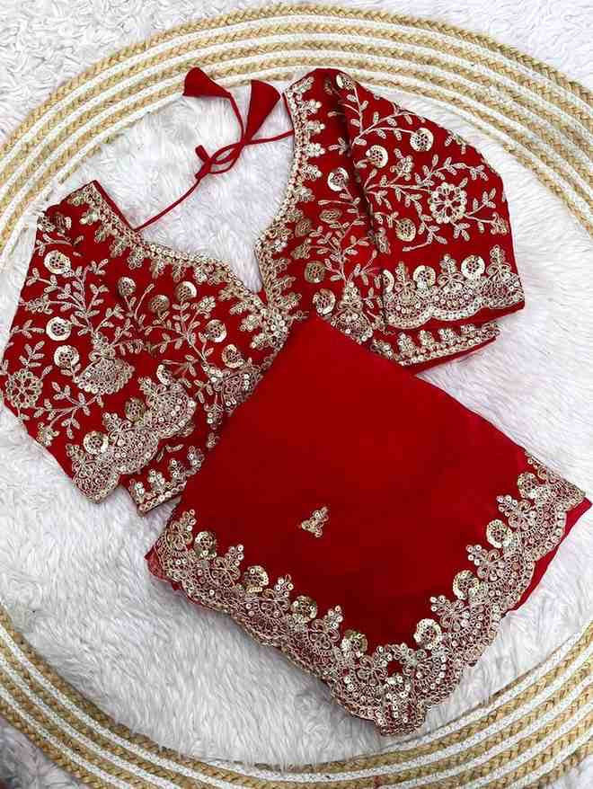 Traditional Saree with ready blouse from Saree Ghor Charlotte, featuring intricate fabric and vibrant cultural design for women.