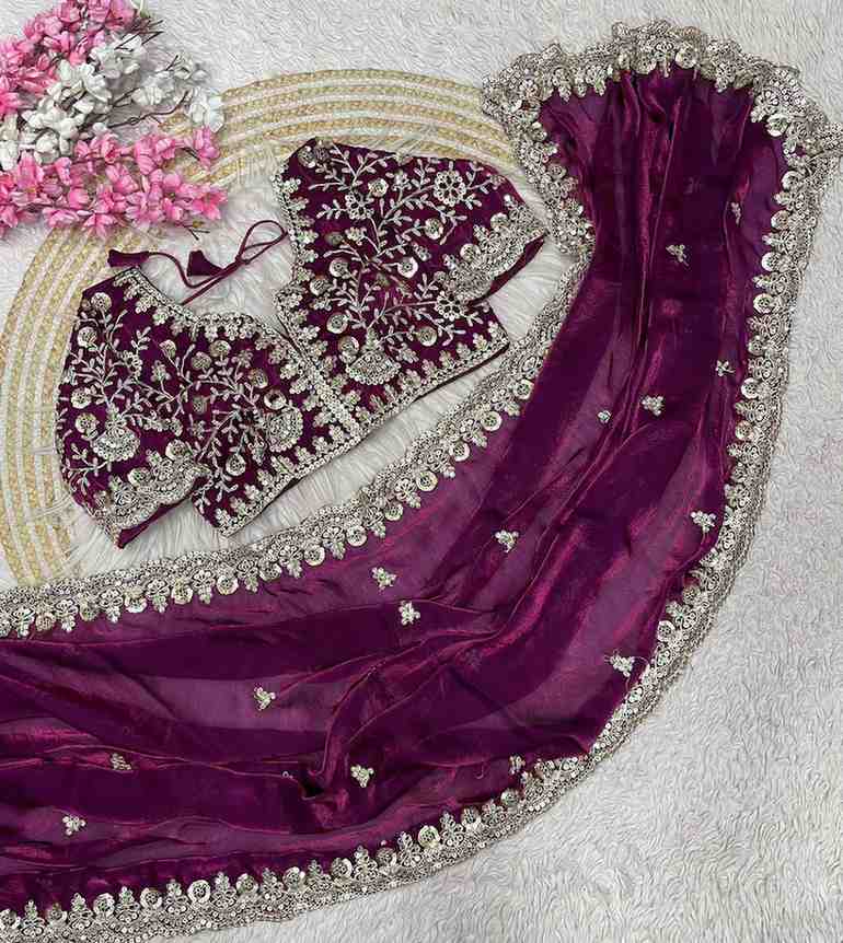 Traditional Saree with ready blouse from Saree Ghor Charlotte, showcasing intricate fabric and elegant draping for cultural wear.