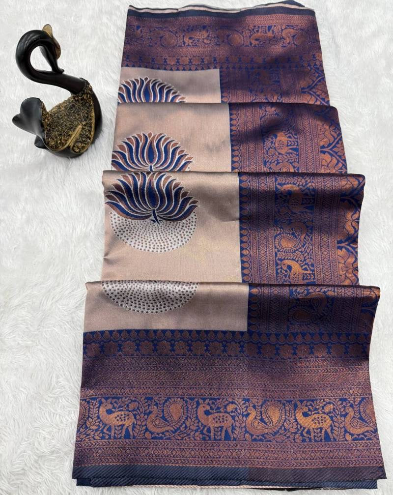 Traditional saree from Saree Ghor Charlotte featuring intricate patterns and vibrant colors, perfect for cultural wear for women.