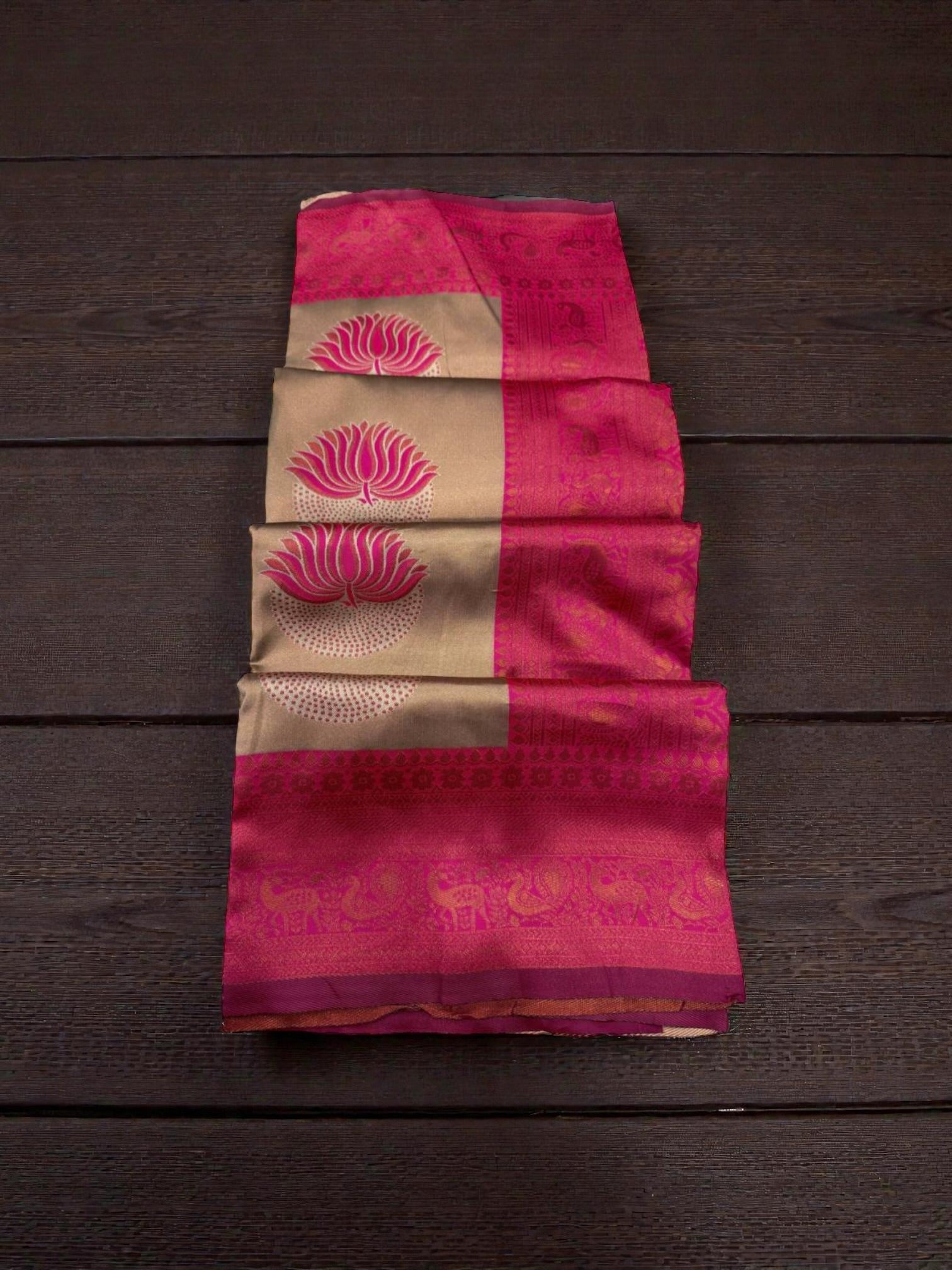 Traditional Saree for women by Saree Ghor Charlotte, showcasing intricate fabric and vibrant cultural design.