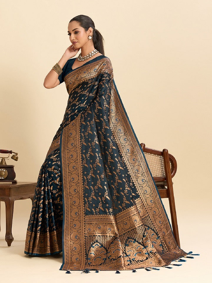 Elegant soft silk traditional saree for women from Saree Ghor Charlotte, showcasing intricate border and vibrant cultural design.