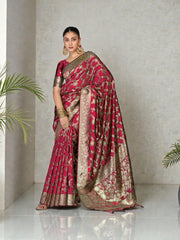 Elegant Banarasi Silk saree by Saree Ghor Charlotte featuring intricate gold zari work and traditional cultural design for women.