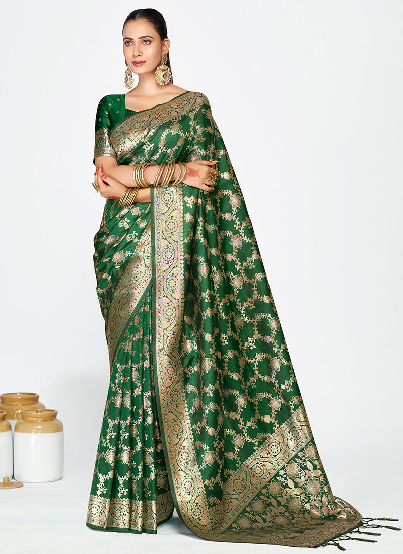 Elegant Banarasi Silk saree from Saree Ghor Charlotte featuring intricate gold zari work and vibrant traditional design.