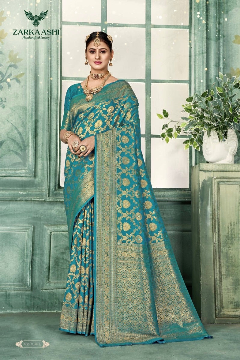 Elegant Katan Silk traditional saree by Saree Ghor Charlotte, featuring intricate designs and vibrant colors for cultural wear.
