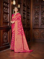 Katan Silk Traditional Saree in rich colors, draped elegantly on a mannequin, showcasing intricate patterns and texture.