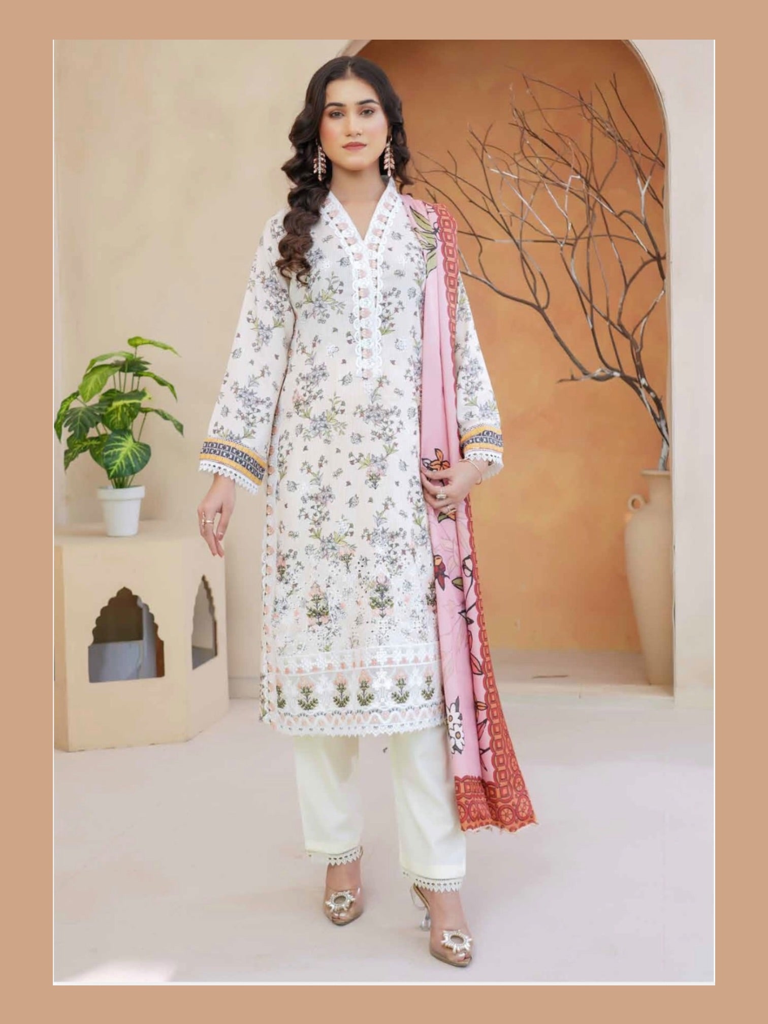 Traditional Pakistani Salwar Kameez for women, featuring vibrant fabric and intricate embroidery, from Saree Ghor Charlotte.
