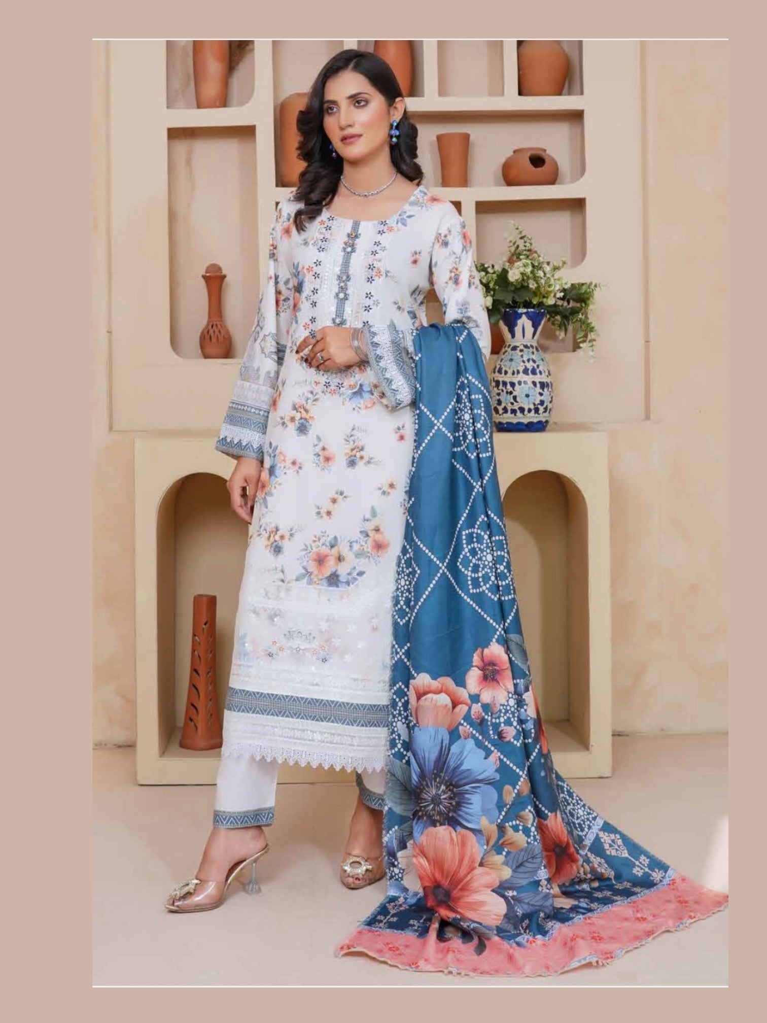 Traditional Pakistani Salwar Kameez for women featuring vibrant fabric and intricate embroidery, by Saree Ghor Charlotte.