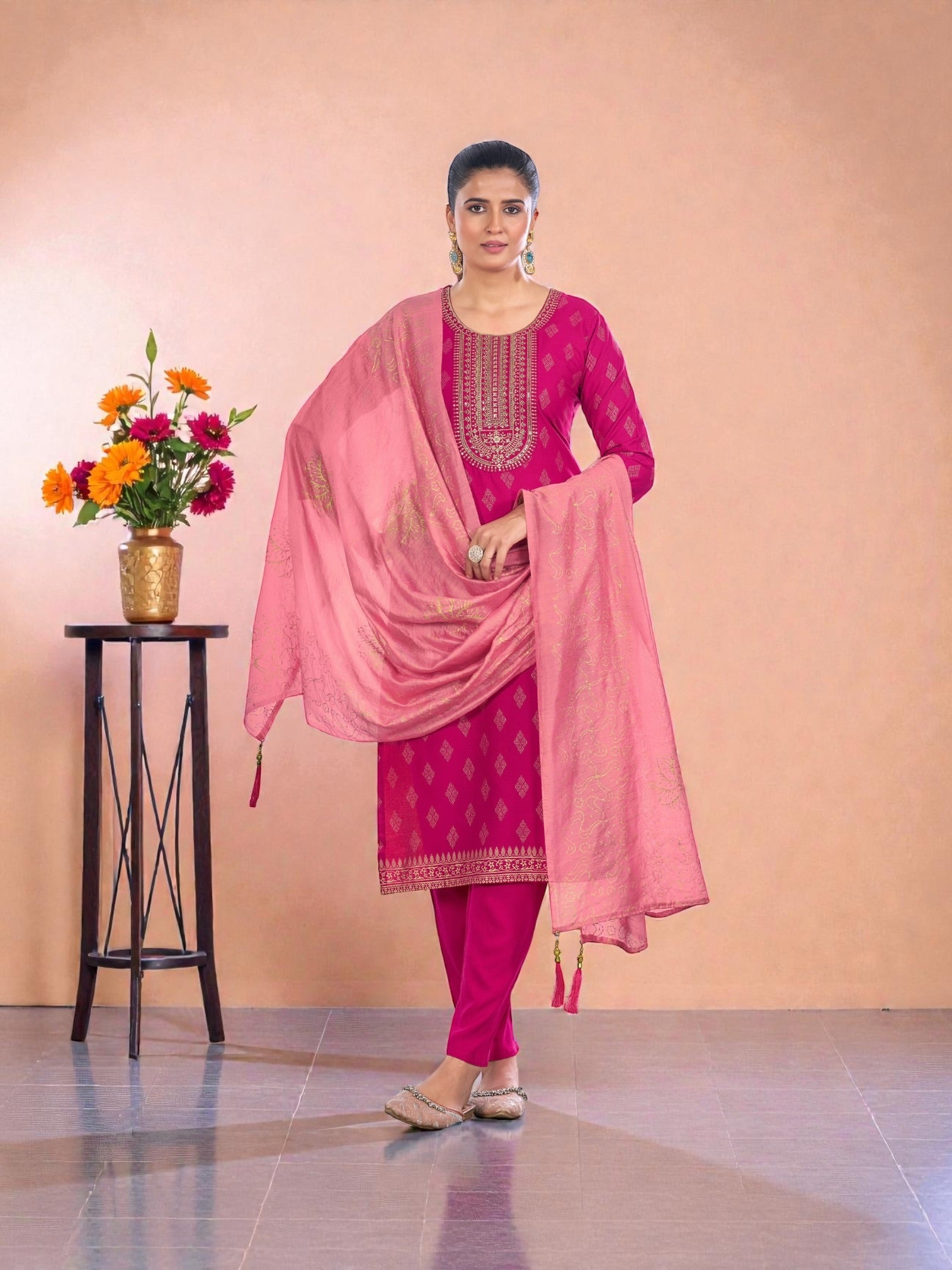 Colorful printed rayon salwar kameez for women from Saree Ghor Charlotte, traditional cultural wear with intricate patterns.