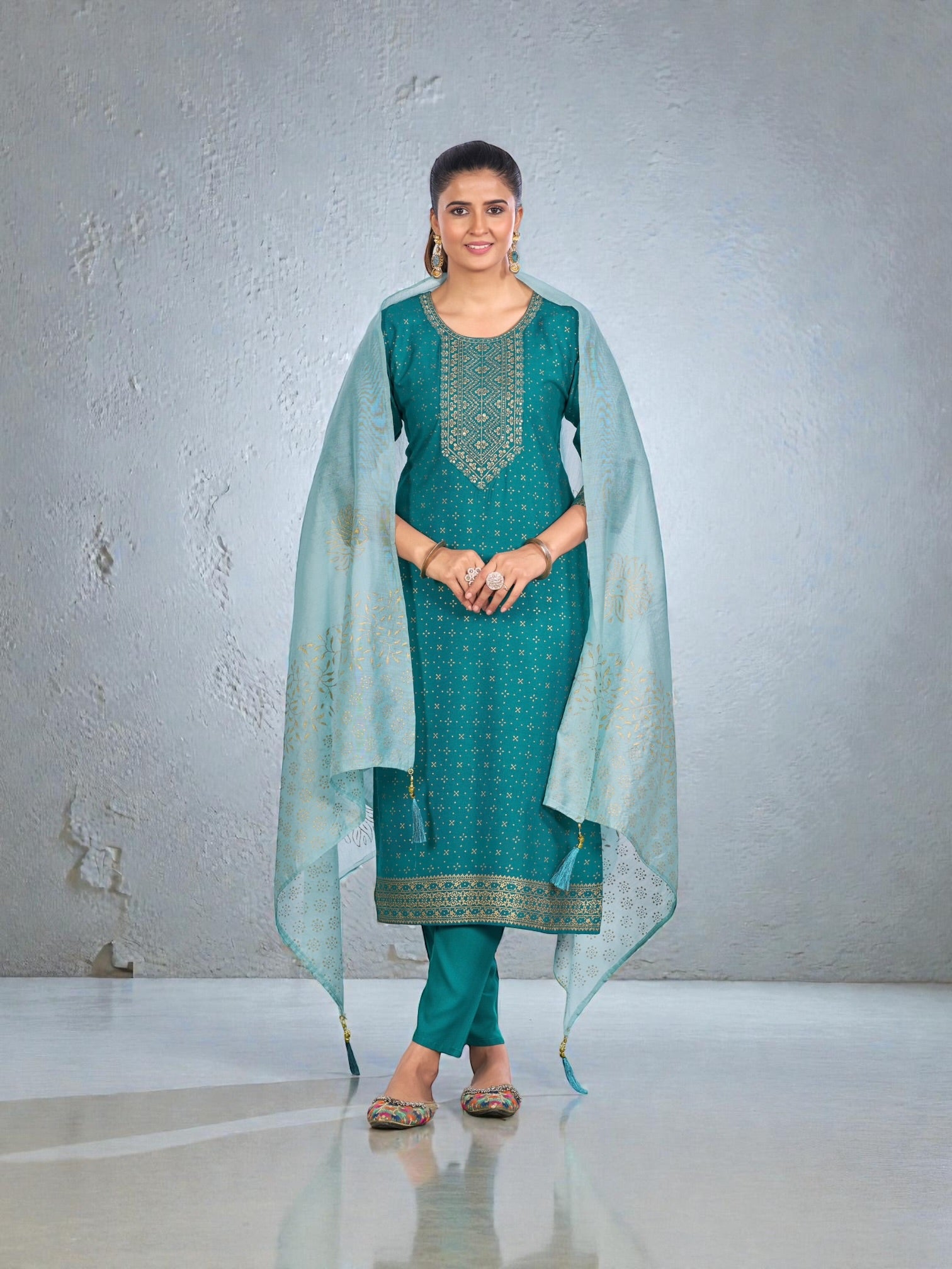 Rayon printed traditional salwar kameez in vibrant colors, showcasing detailed patterns for women's cultural wear.