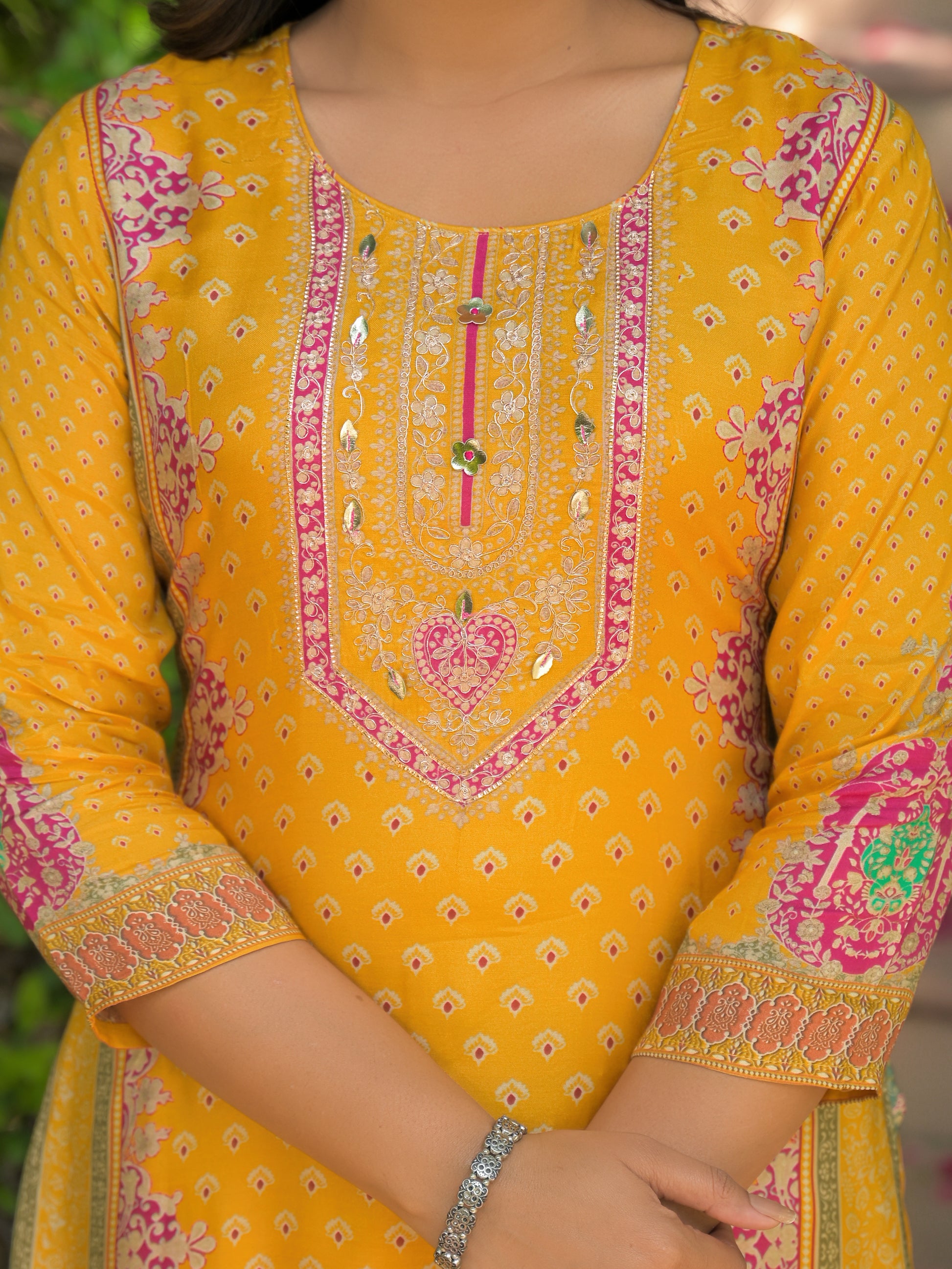 Pure viscose Maslin traditional salwar kameez for women, featuring intricate embroidery and vibrant colors, by Saree Ghor Charlotte.