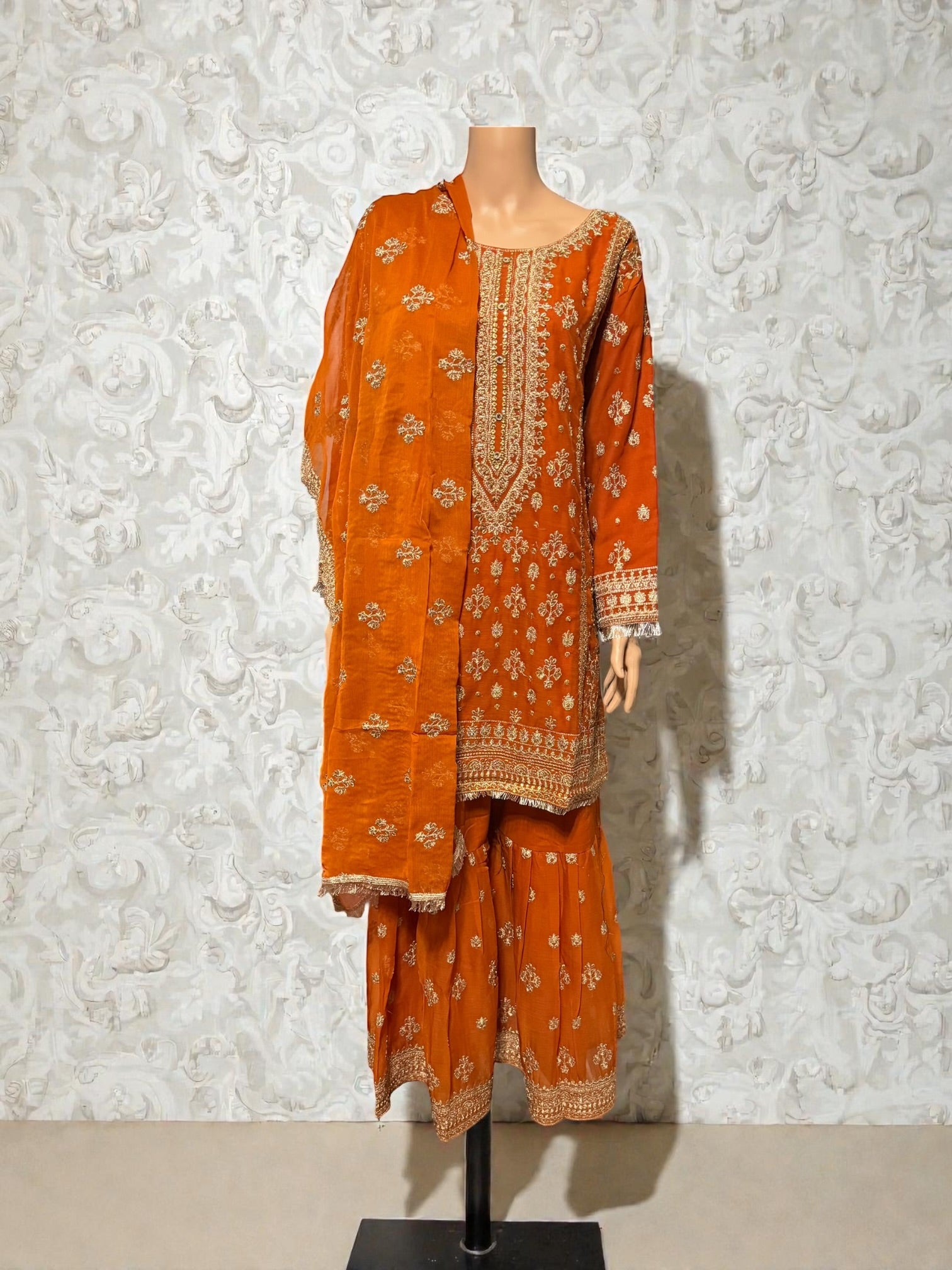 Traditional Saree Ghor Charlotte salwar kameez for women featuring intricate embroidery and vibrant colors, perfect for cultural wear.