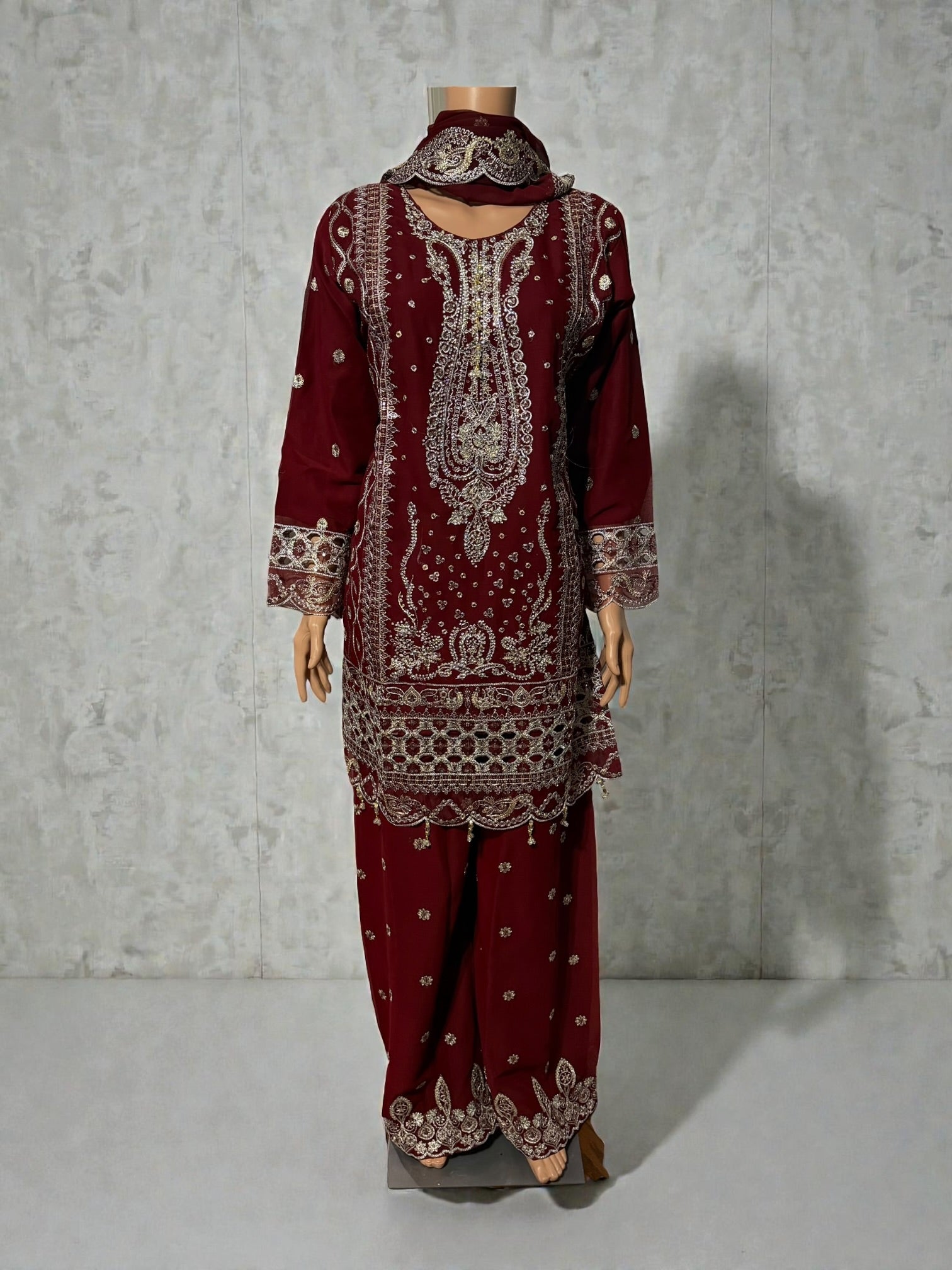Traditional Saree Ghor Charlotte Salwar Kameez for women, featuring intricate embroidery and vibrant cultural design.