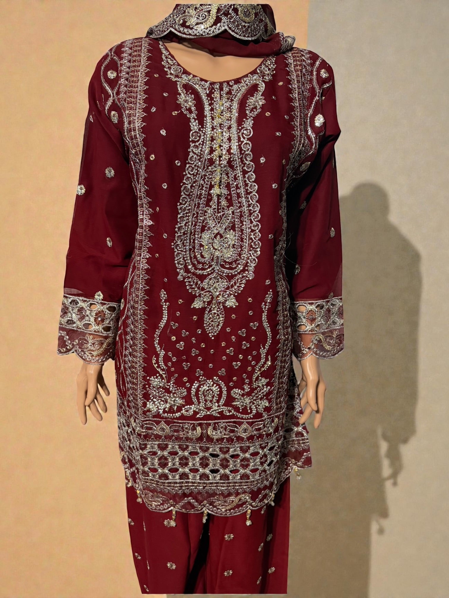 Traditional Salwar Kameez for women with intricate embroidery, in vibrant colors, from Saree Ghor Charlotte.
