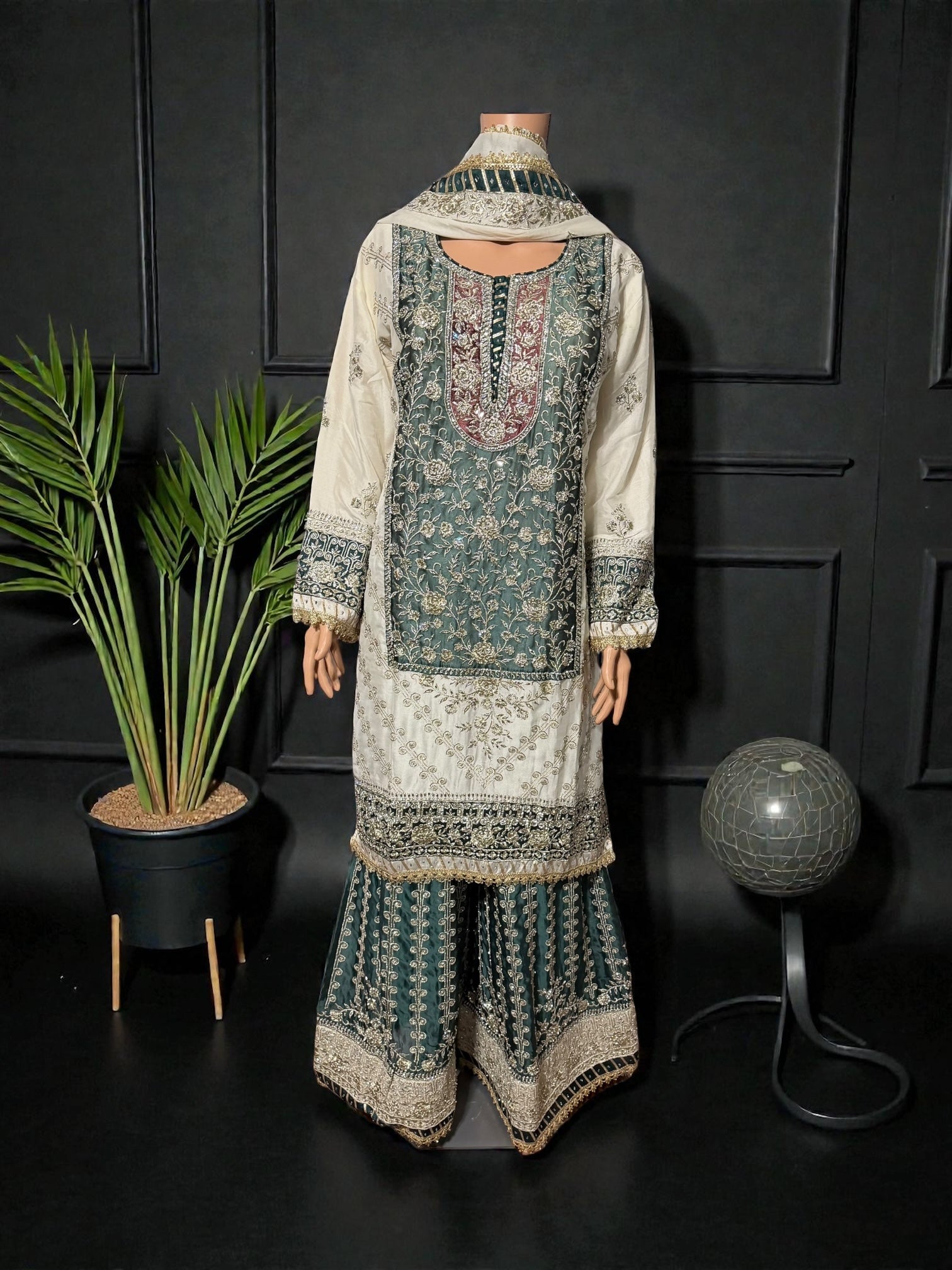 Rangoli Russian Plazo dress by Saree Ghor Charlotte, cultural women's salwar kameez with vibrant traditional patterns and fabric details.