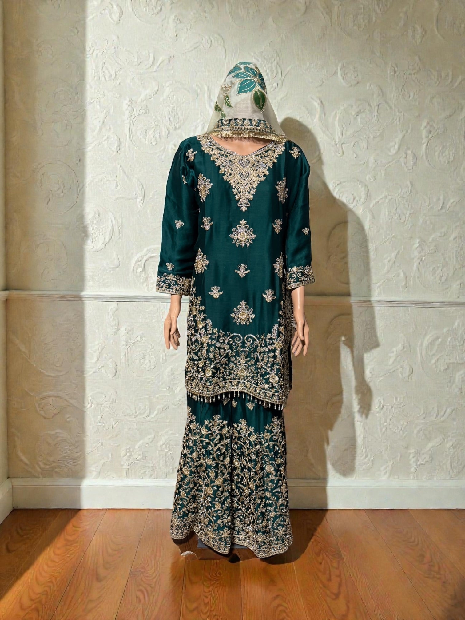 Russian Plazo dress by Saree Ghor Charlotte featuring vibrant patterns and flowing fabric, traditional cultural wear for women.
