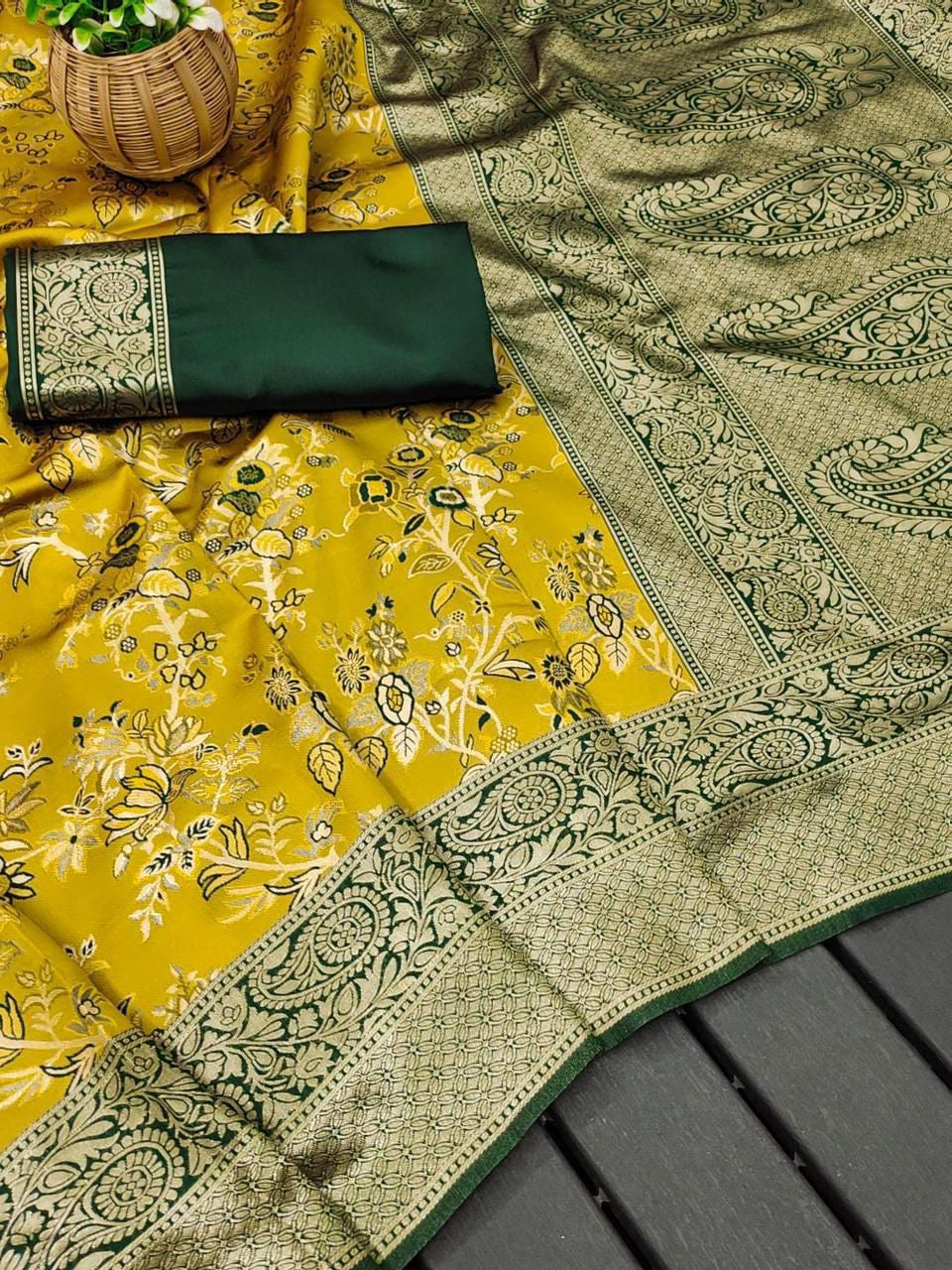 Elegant Lichi silk saree with unstitched blouse from Saree Ghor Charlotte, showcasing vibrant fabric and traditional Indian design.