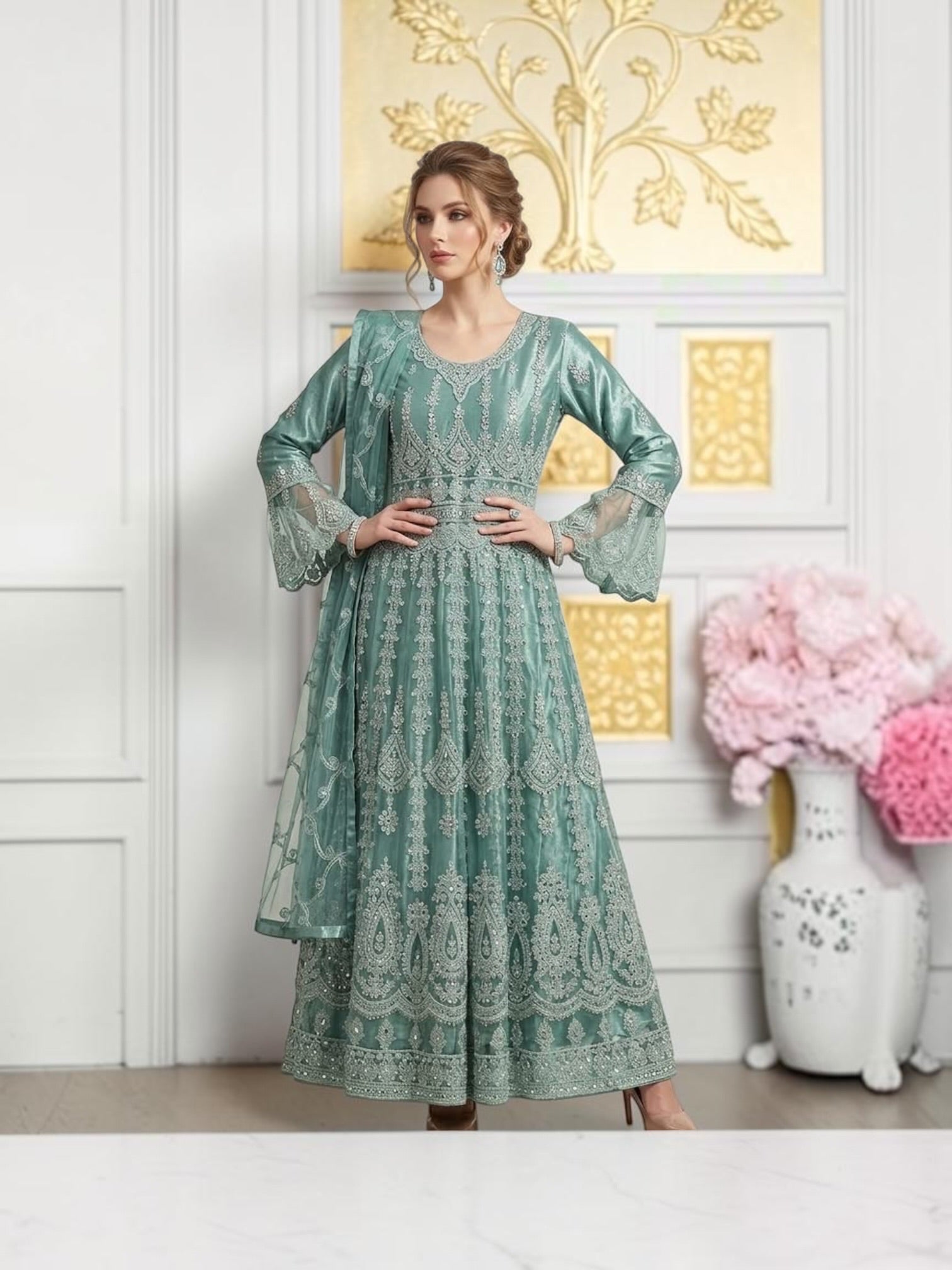Traditional designer maxi gown, cultural wear for women, by Saree Ghor Charlotte, featuring intricate embroidery and flowing fabric.