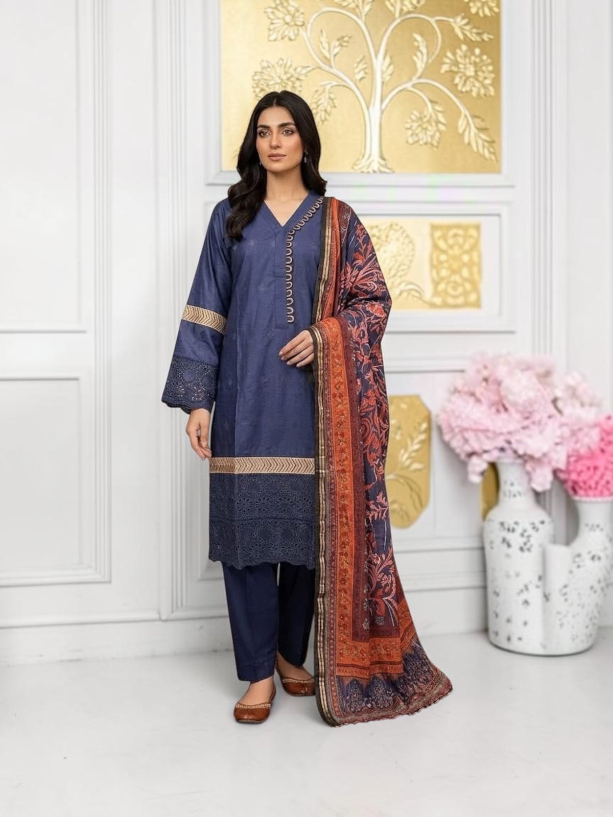 Traditional Saree Ghor Charlotte Salwar Kameez set for women, featuring vibrant fabric and intricate embroidery.