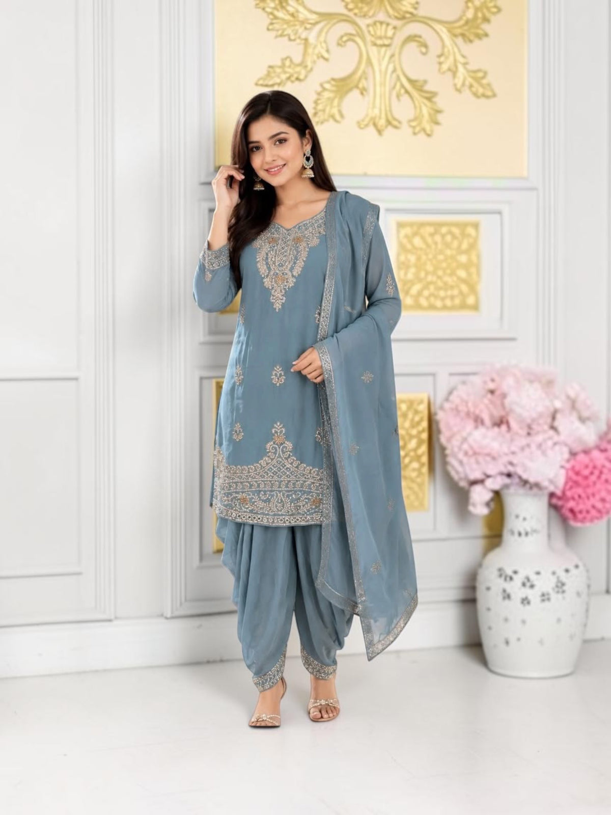 Traditional designer Patiala Dhuti Salwar Kameez suit for women, featuring intricate embroidery and vibrant cultural wear.
