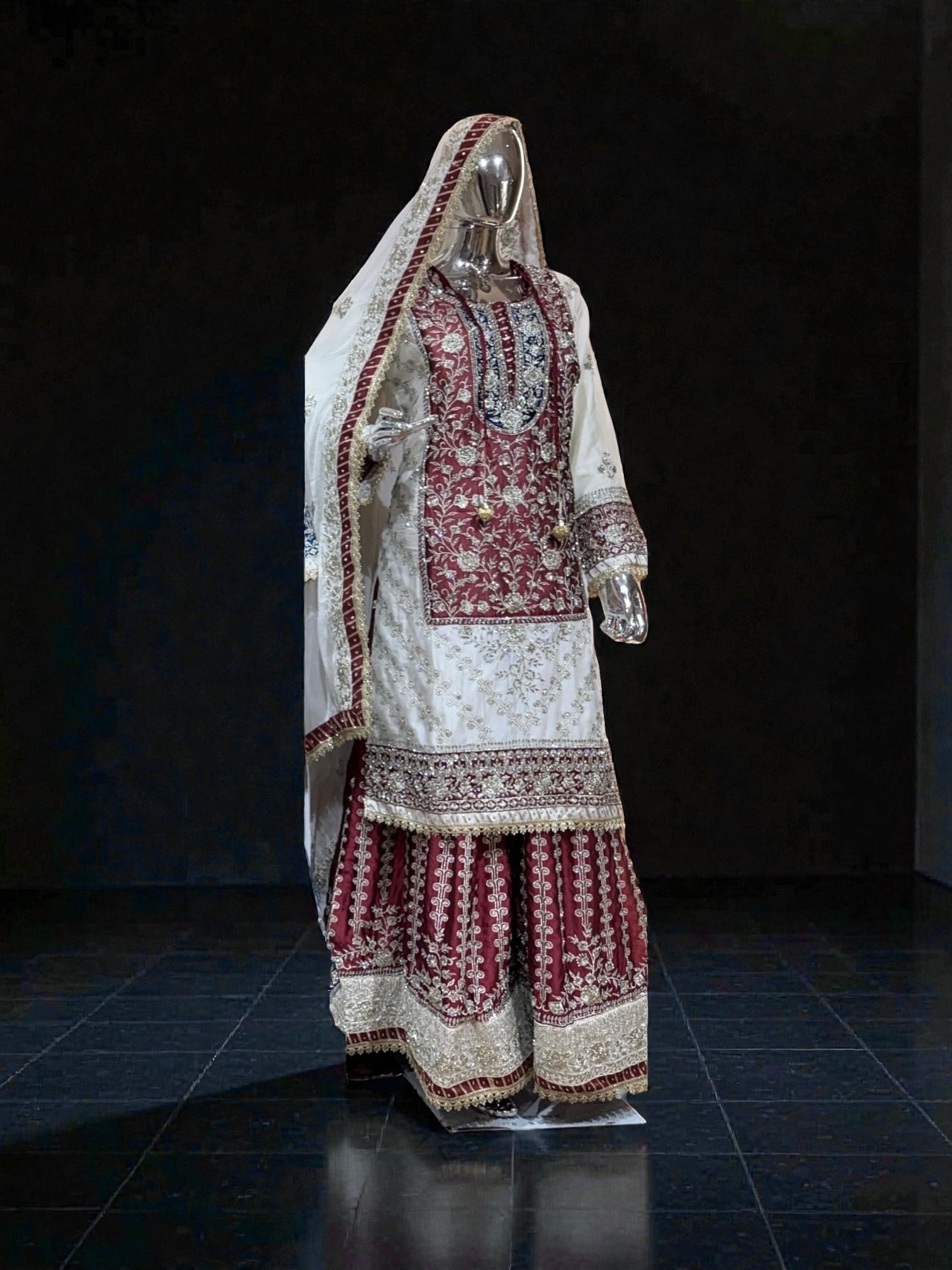 Rangoli Russian Plazo Dress, a vibrant Salwar Kameez for women, showcasing intricate cultural patterns and flowing design.
