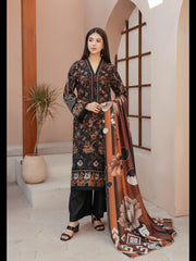 Traditional Pakistani Salwar Kameez for women by Saree Ghor Charlotte, featuring vibrant fabric and intricate embroidery.