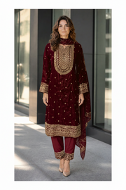 Traditional Salwar Kameez for women by Saree Ghor Charlotte, showcasing vibrant fabric and intricate embroidery.