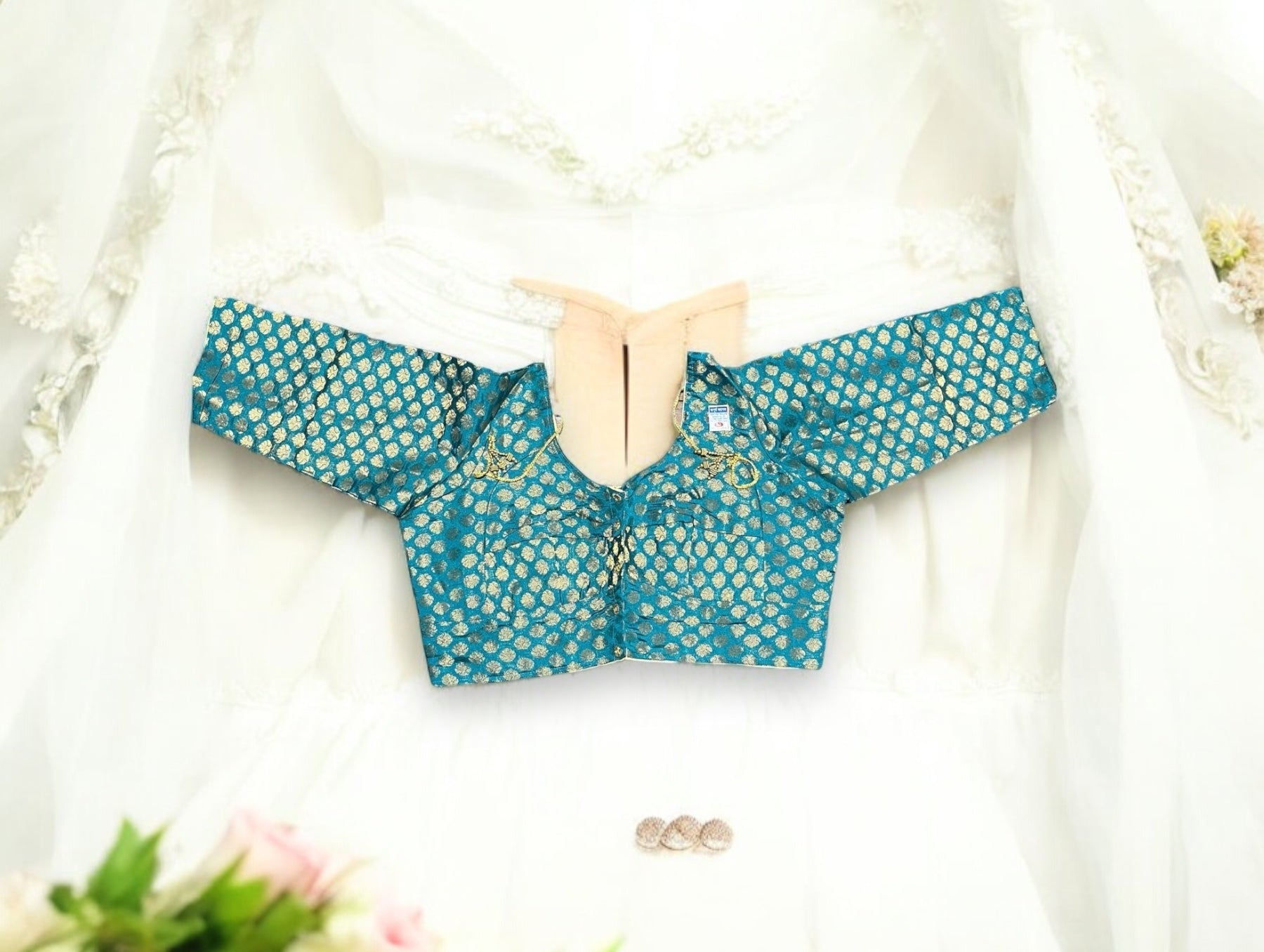 Green traditional ready-made saree blouse by Saree Ghor Charlotte, featuring ethnic design and intricate detailing for women.