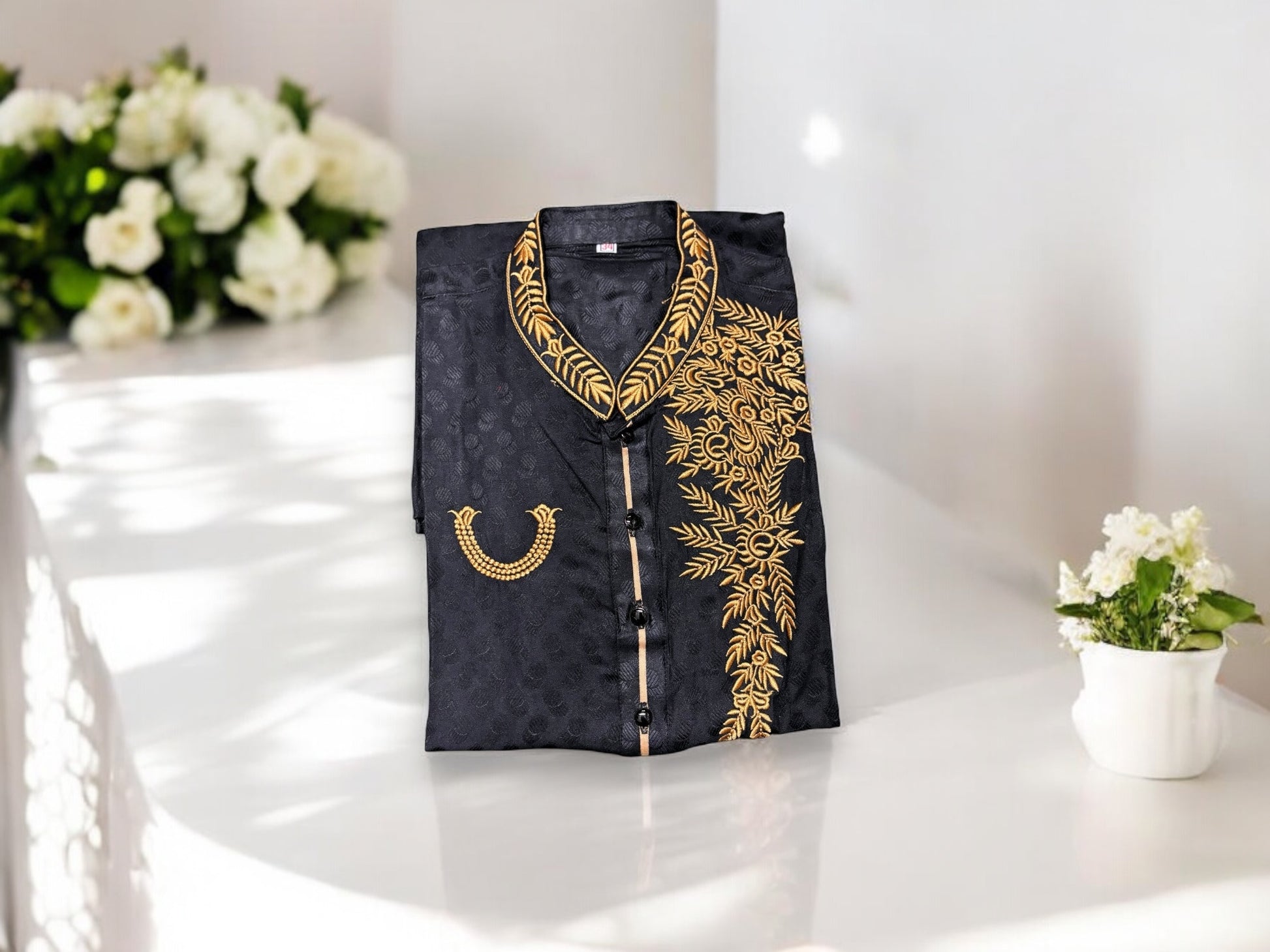 Black soft cotton traditional boys kurta by Saree Ghor Charlotte, featuring classic design for young boys.