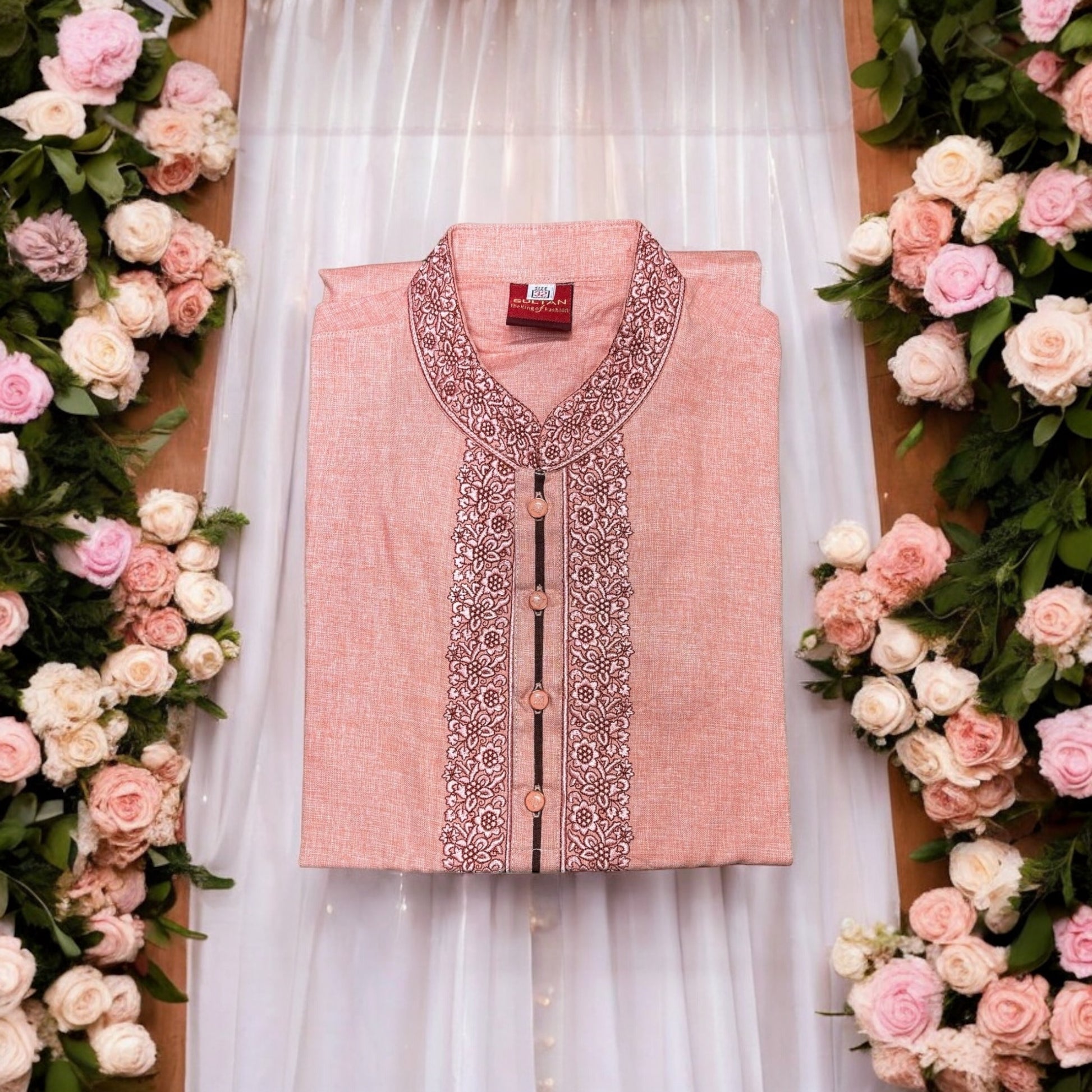 Light pink soft cotton boys kurta by Saree Ghor Charlotte, traditional style with subtle embroidery for 2-year-old boys.