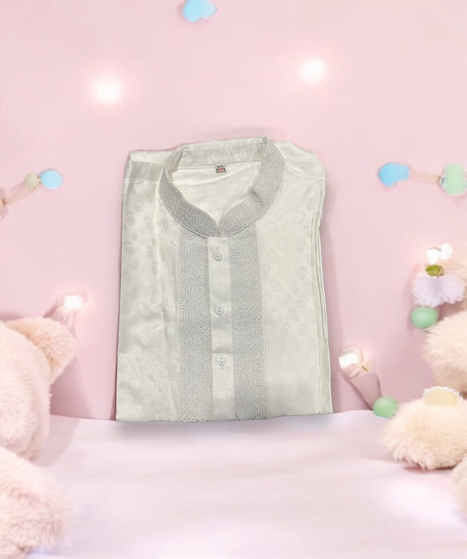 White cotton boys kurta with traditional design, from Saree Ghor Charlotte, perfect for cultural and ethnic wear for young boys.