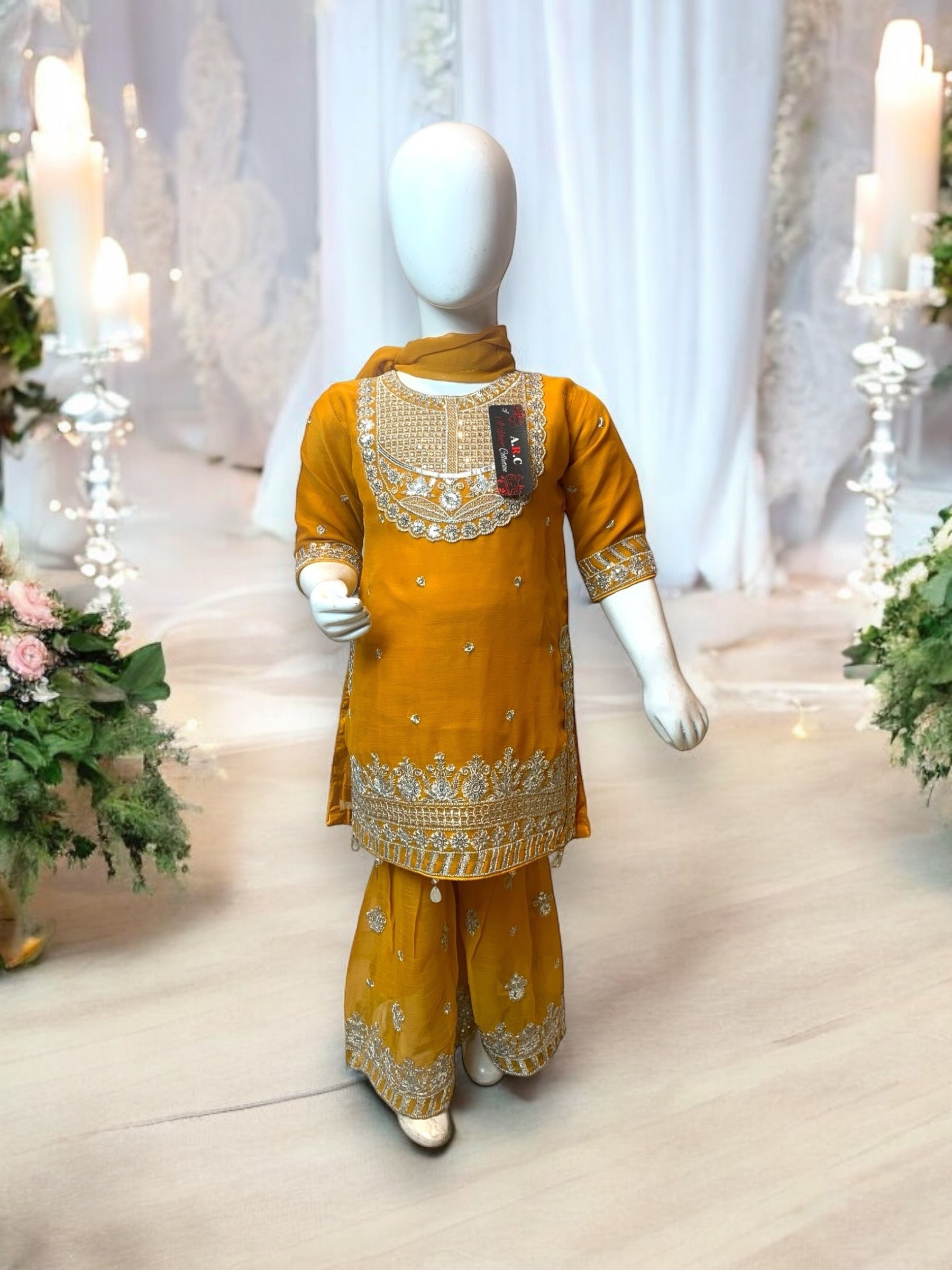 Elegant girls' designer Salwar Kameez by Saree Ghor Charlotte for ages 6-12 months, featuring colorful ethnic style and intricate embroidery.