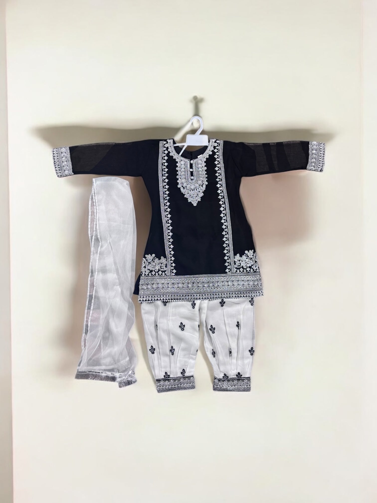 Elegant traditional designer salwar kameez for little girls, showcasing vibrant fabric and intricate embroidery by Saree Ghor Charlotte.