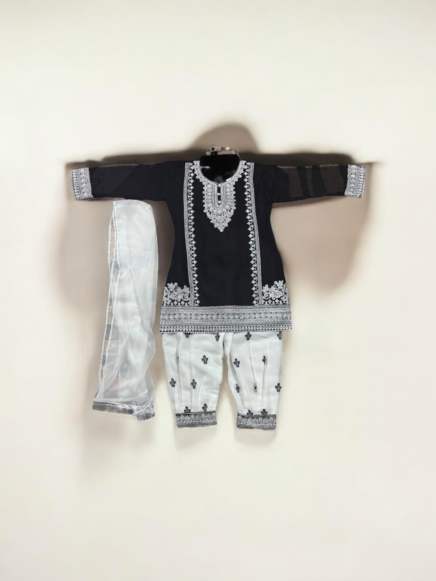 Elegant traditional designer salwar kameez for little girls, Saree Ghor Charlotte, with colorful fabric and intricate embroidery.