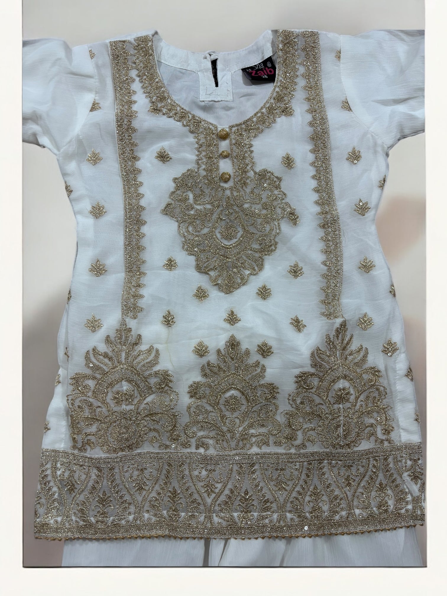 Elegant traditional designer Salwar Kameez for little girls, showcasing colorful fabric and intricate embroidery by Saree Ghor Charlotte.